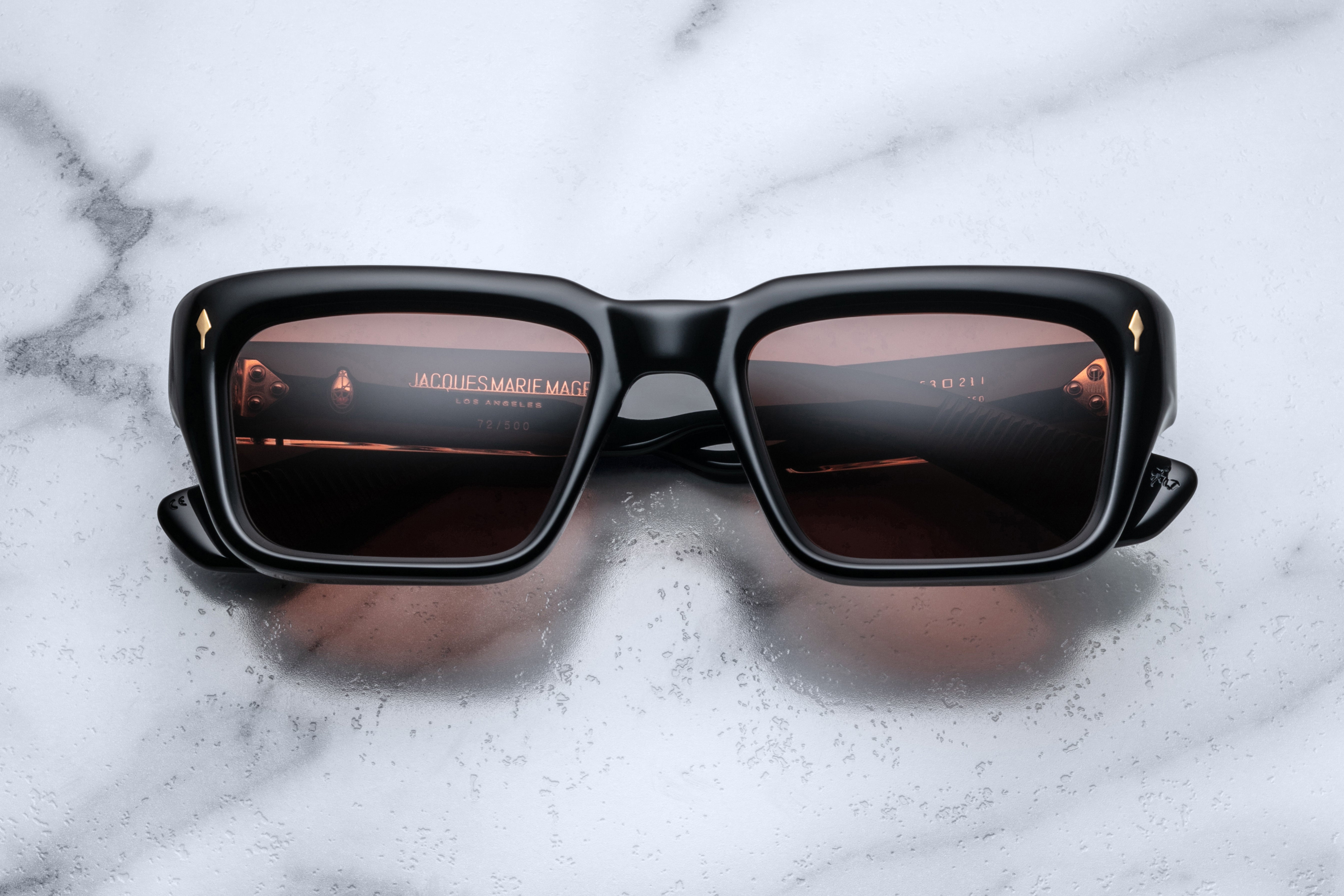 Jacques Marie Mage Walker Eclipse sunglasses with round black frames and dark tinted lenses, front view.