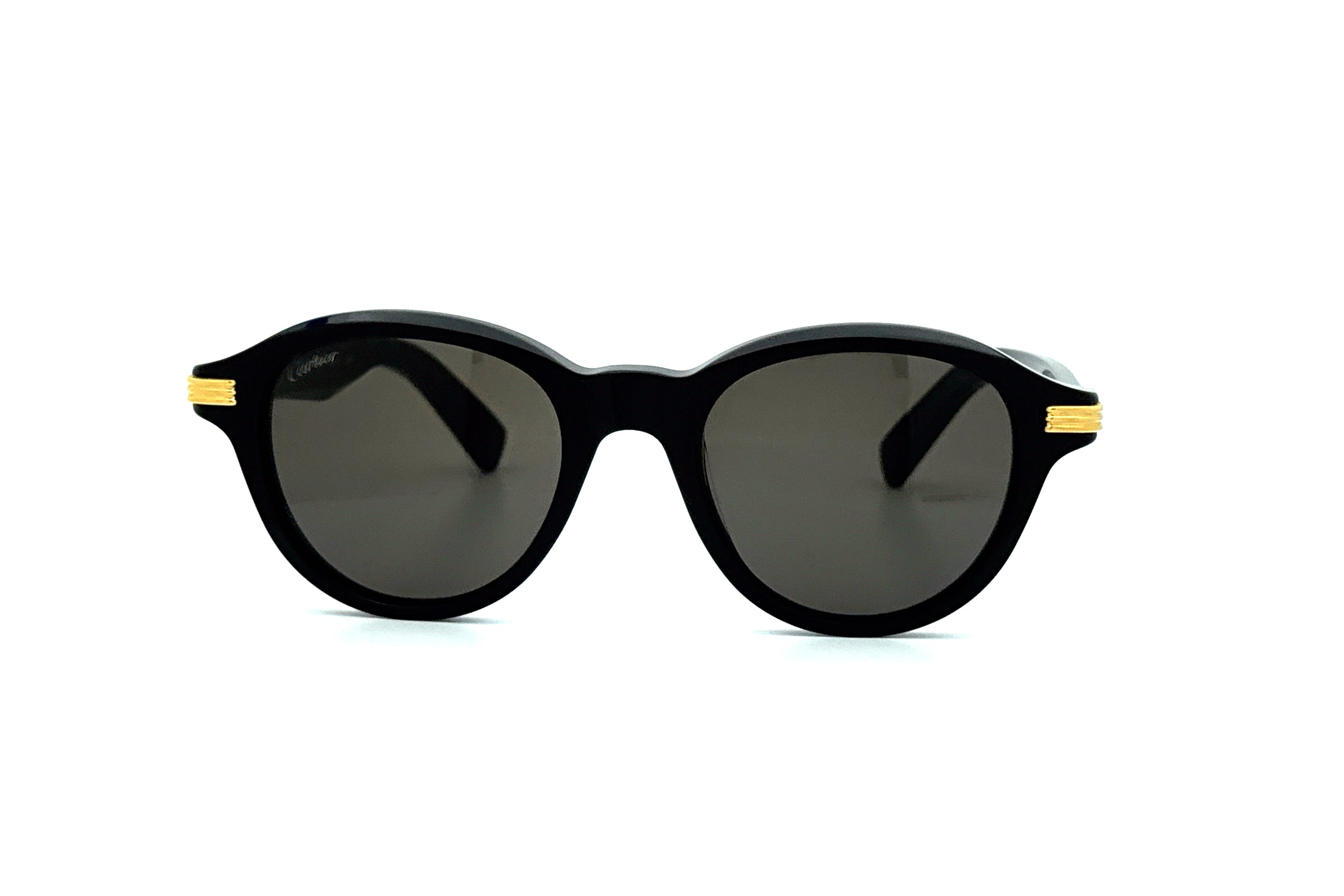 Cartier CT0395S luxury wristwatch with silver dial, stainless steel band, and elegant design.