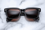 Jacques Marie Mage MOLINO 55 sunglasses with black frames and dark lenses, stylish eyewear for sun protection.