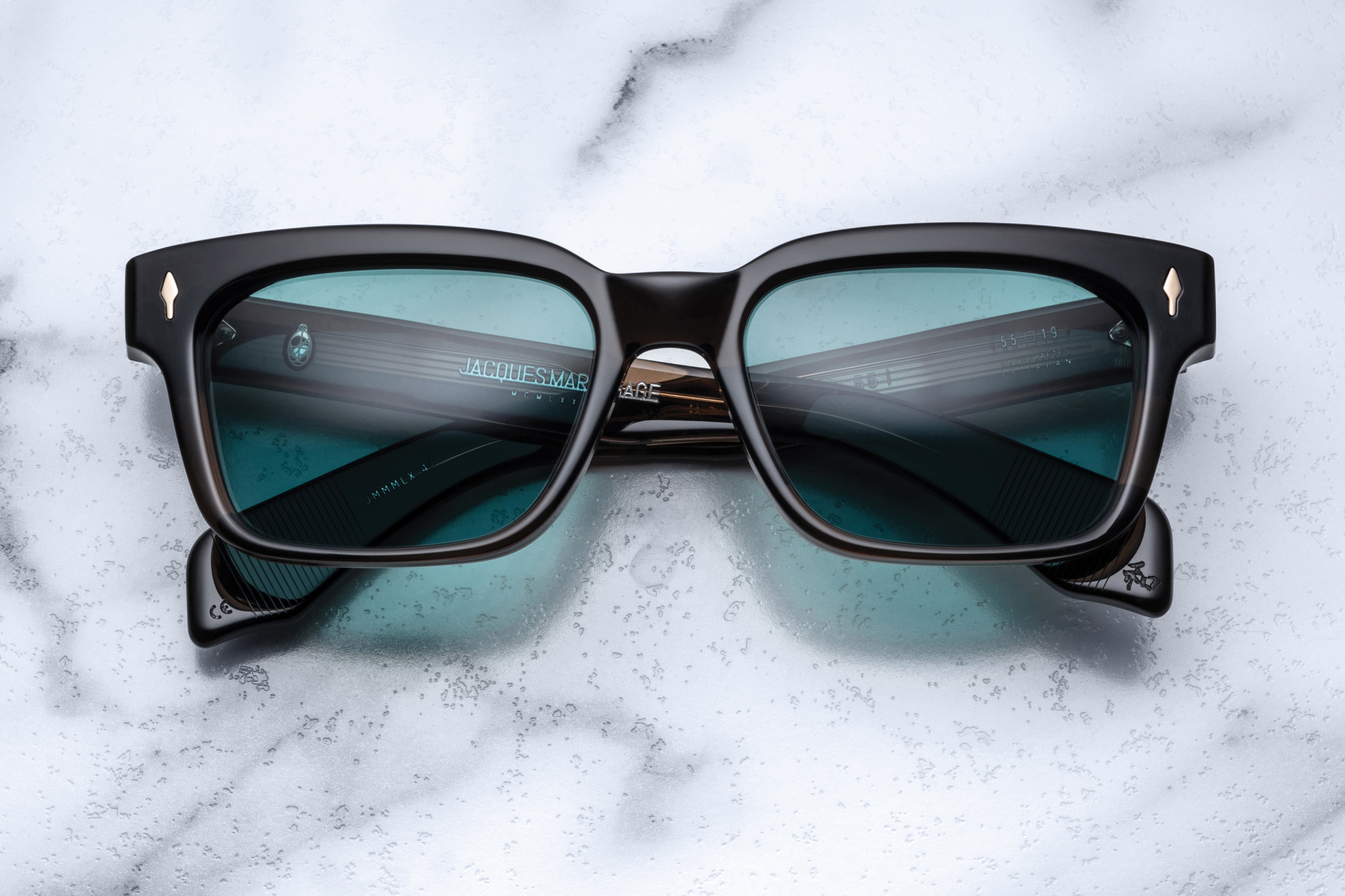 Jacques Marie Mage Molino 55 sunglasses with sleek black frames and tinted lenses, stylish and modern eyewear.