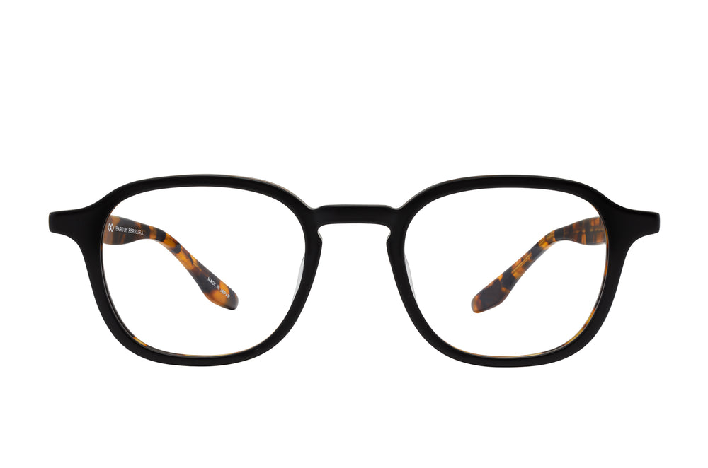 Barton Perreira DALE sunglasses with matte black frames and amber tortoise temples, front view showing stylish eyewear design.