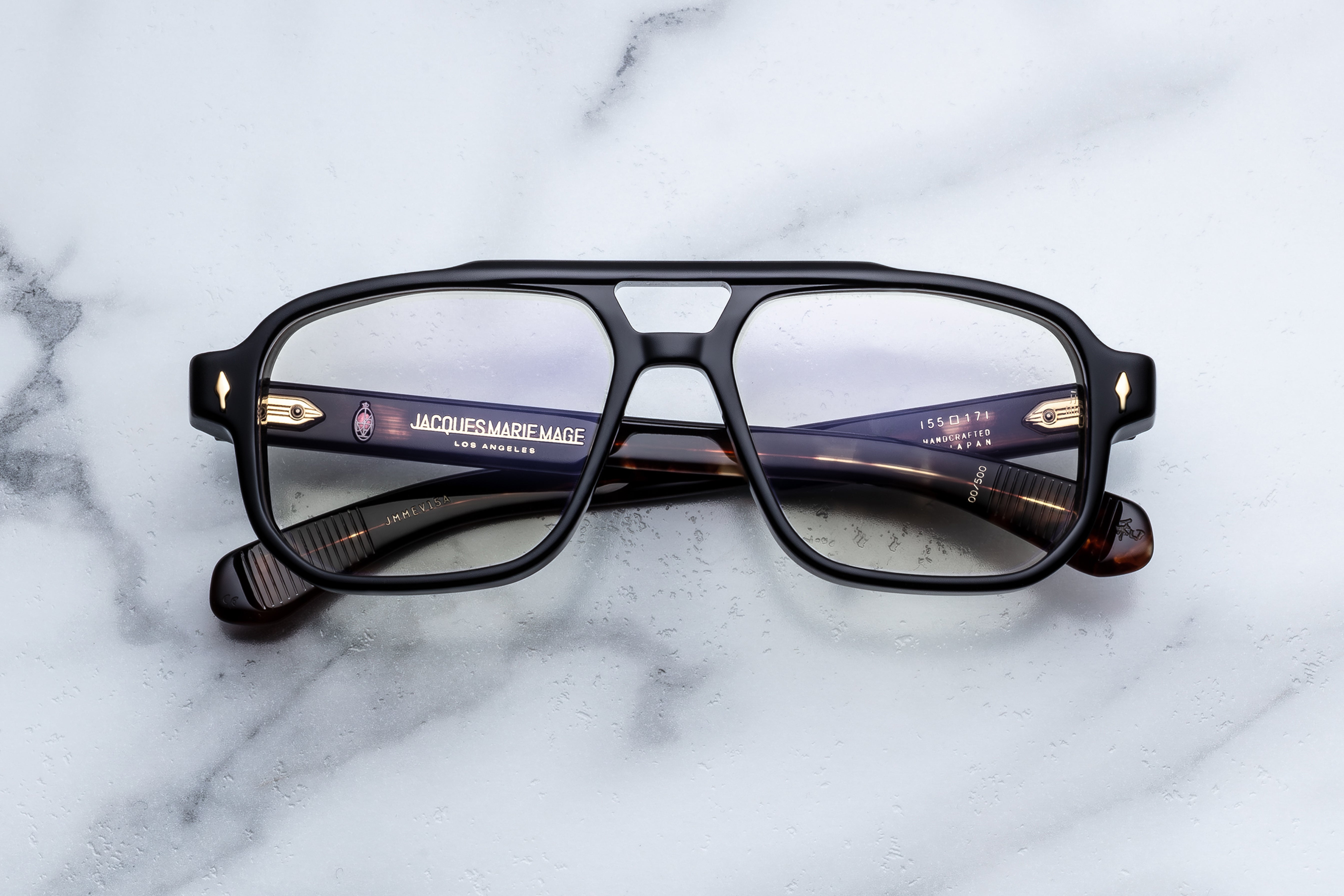 Jacques Marie Mage Evans RX optical glasses with black frames, front view showing sleek design and clear lenses.