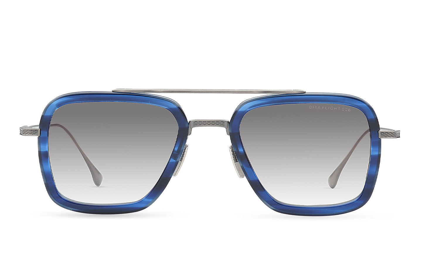 Dita Flight 006 sunglasses with blue-tinted silver frames and clear lenses, front view showing stylish design and branding.