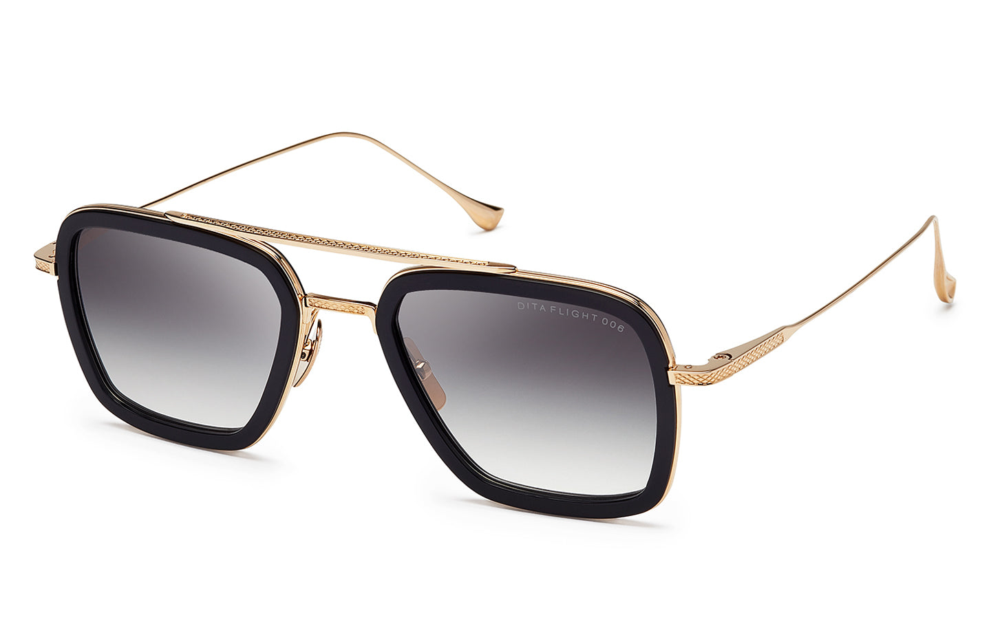 Dita FLIGHT 006 sunglasses with black frame and gold accents, shown from an angled view.