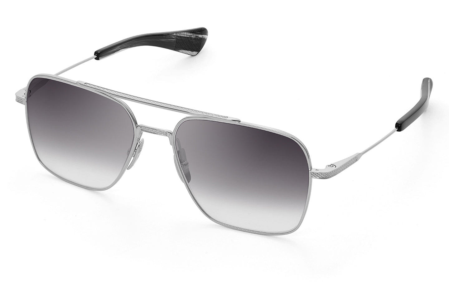 Dita Flight 7 eyeglasses with clear frames and metal temples, shown from an angled view