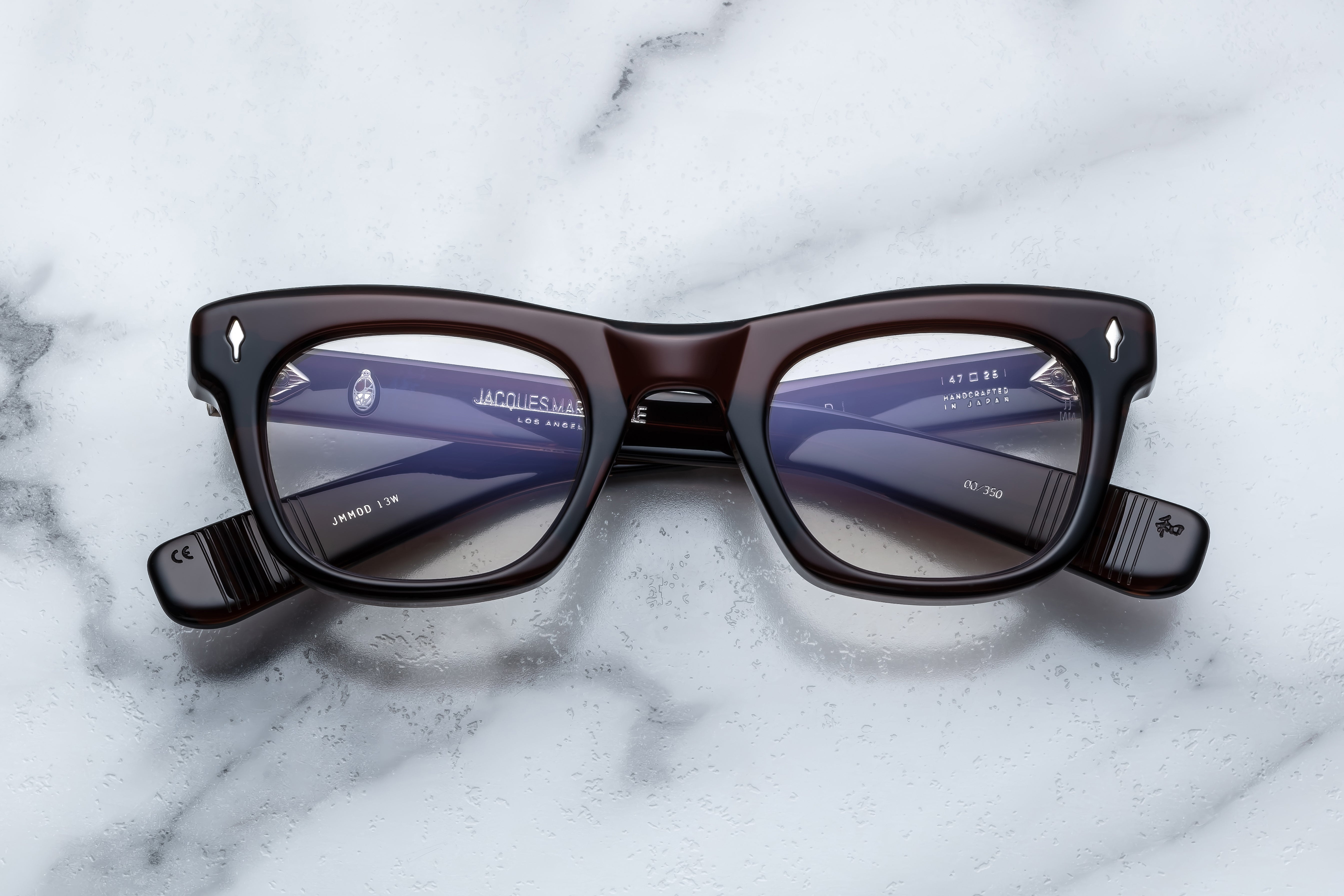 Jacques Marie Mage Godard optical glasses with Zoltar frame, front view showing sleek design and clear lenses.