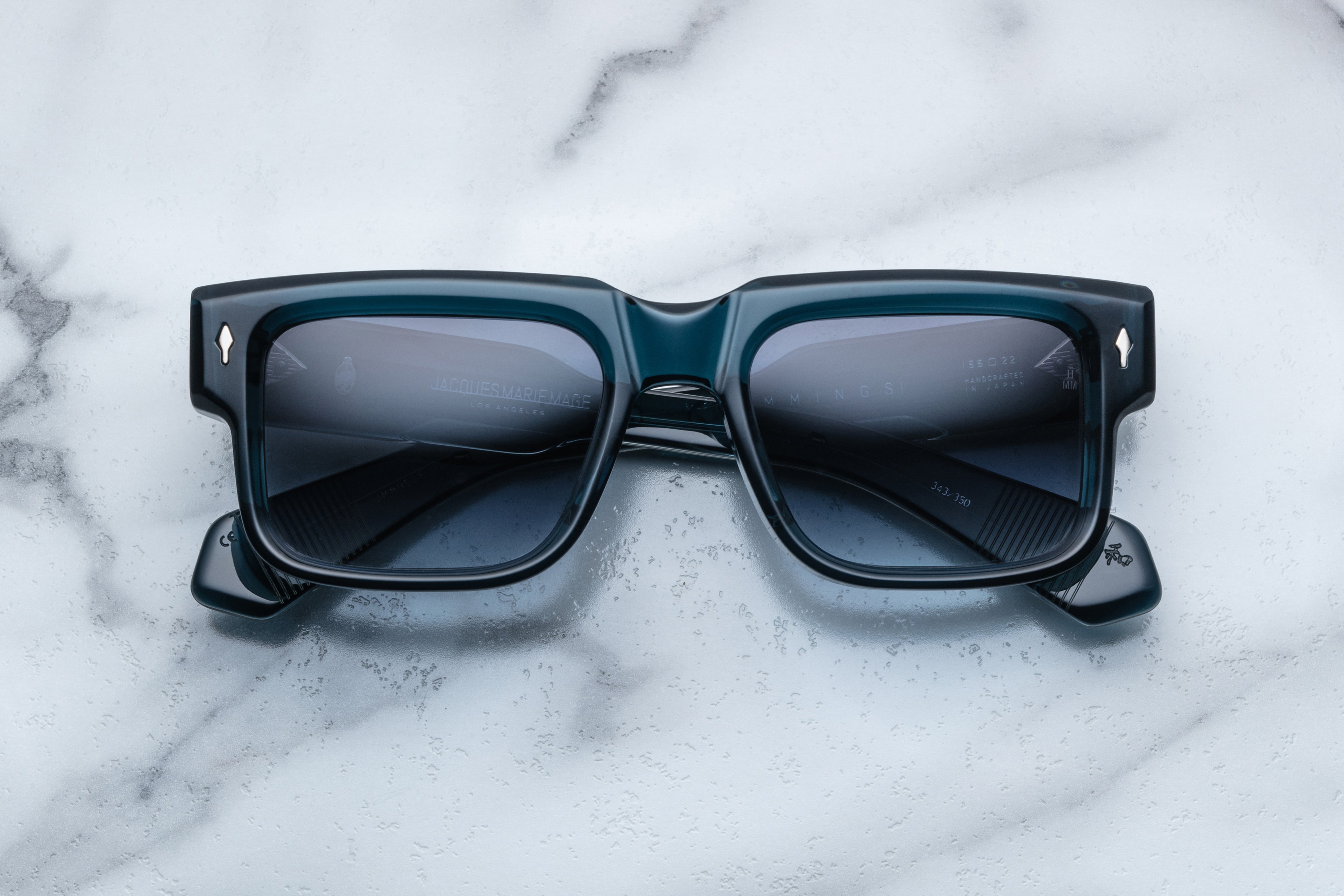Jacques Marie Mage Hemmings sunglasses in indigo with rounded frame and sleek design, shown from the front.
