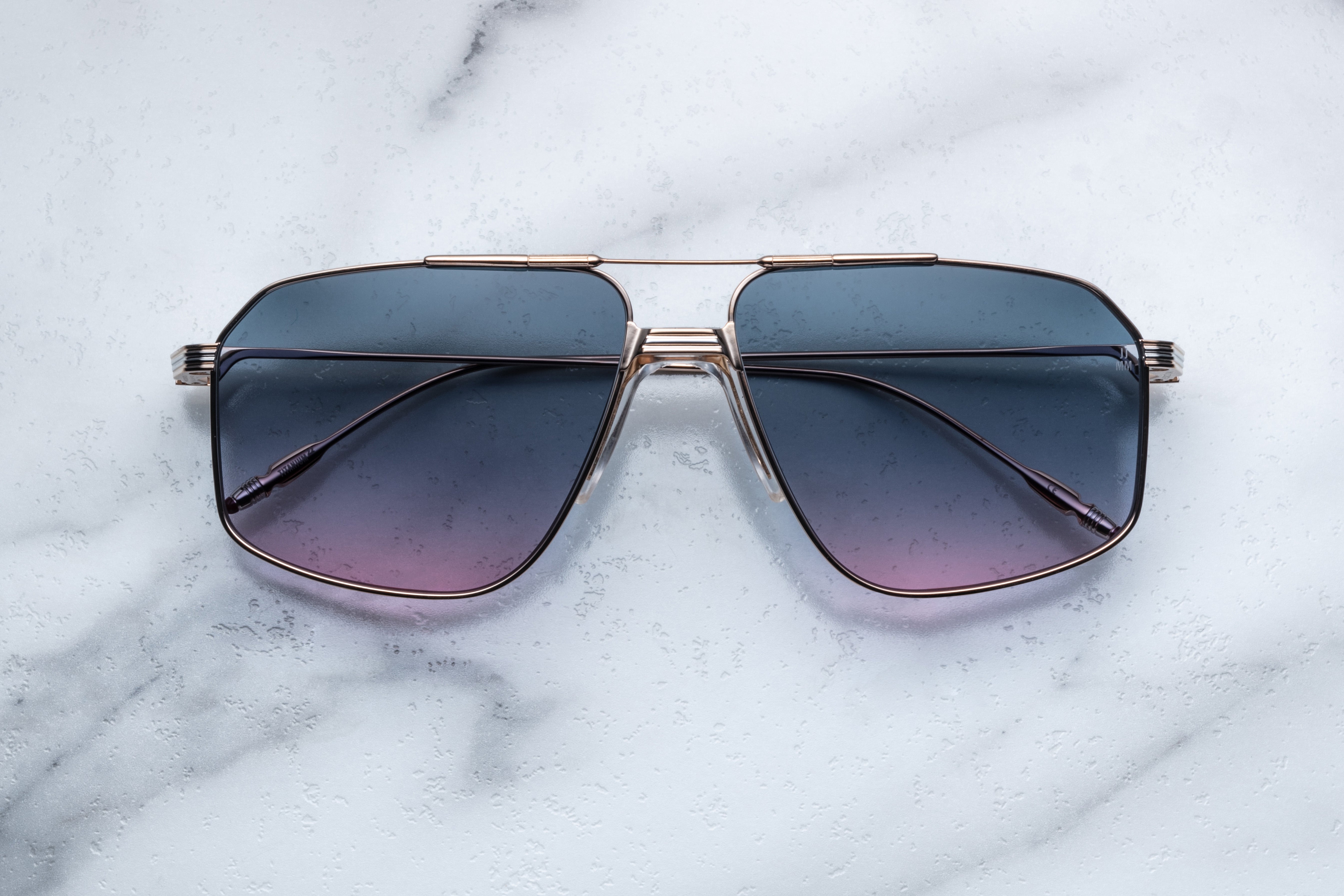 Jacques Marie Mage JAGGER sunglasses with sleek black frames and dark tinted lenses, front view showing modern, stylish design.