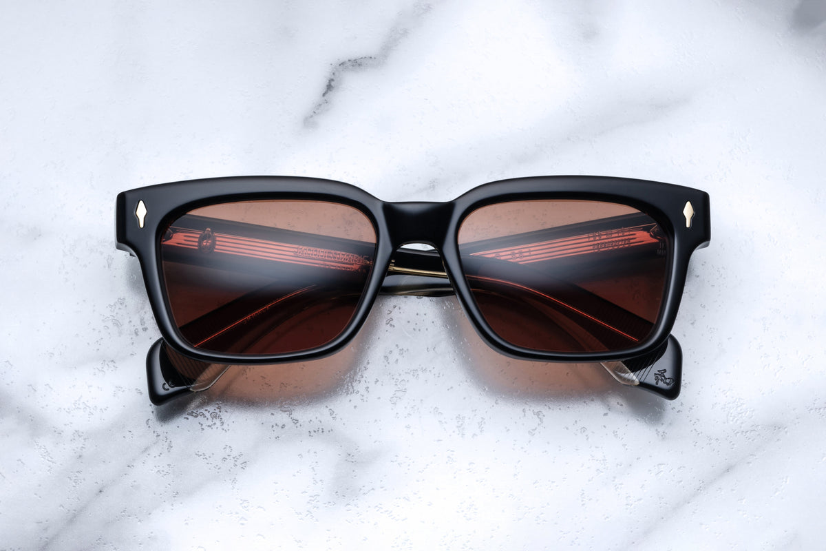 Jacques Marie Mage Molino 55 sunglasses with black Beluga frames, front view showing sleek, modern design.