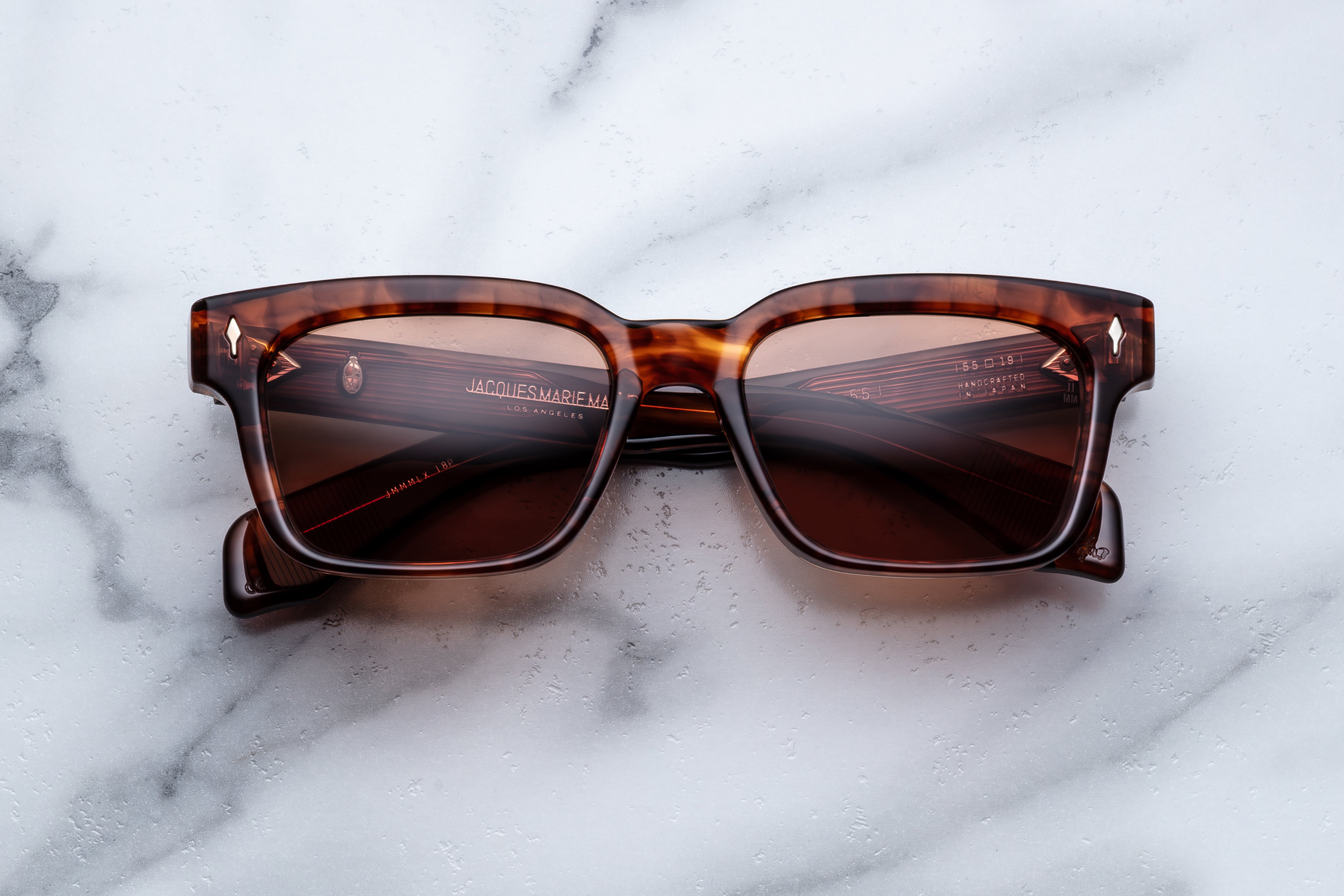 Jacques Marie Mage Molino 55 sunglasses with bourbon-colored frames, front view showing sleek, stylish design.
