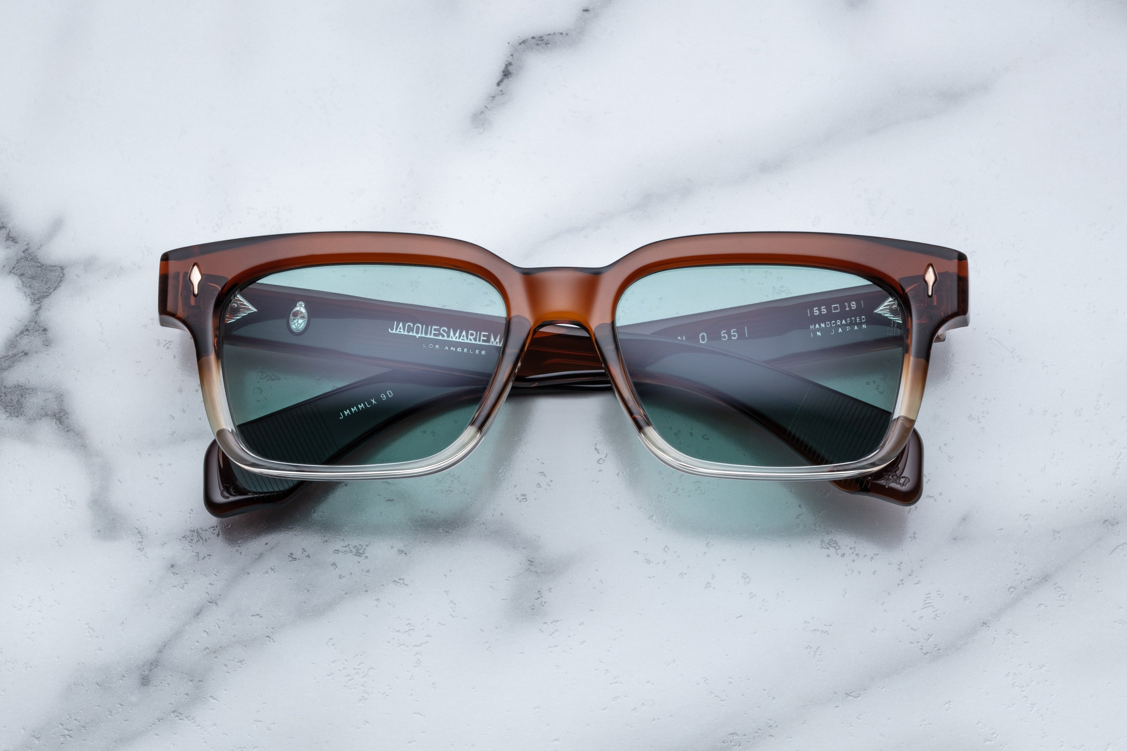 Jacques Marie Mage Molino 55 sunglasses with hickory fade frames and clear lenses, front view showing stylish design.