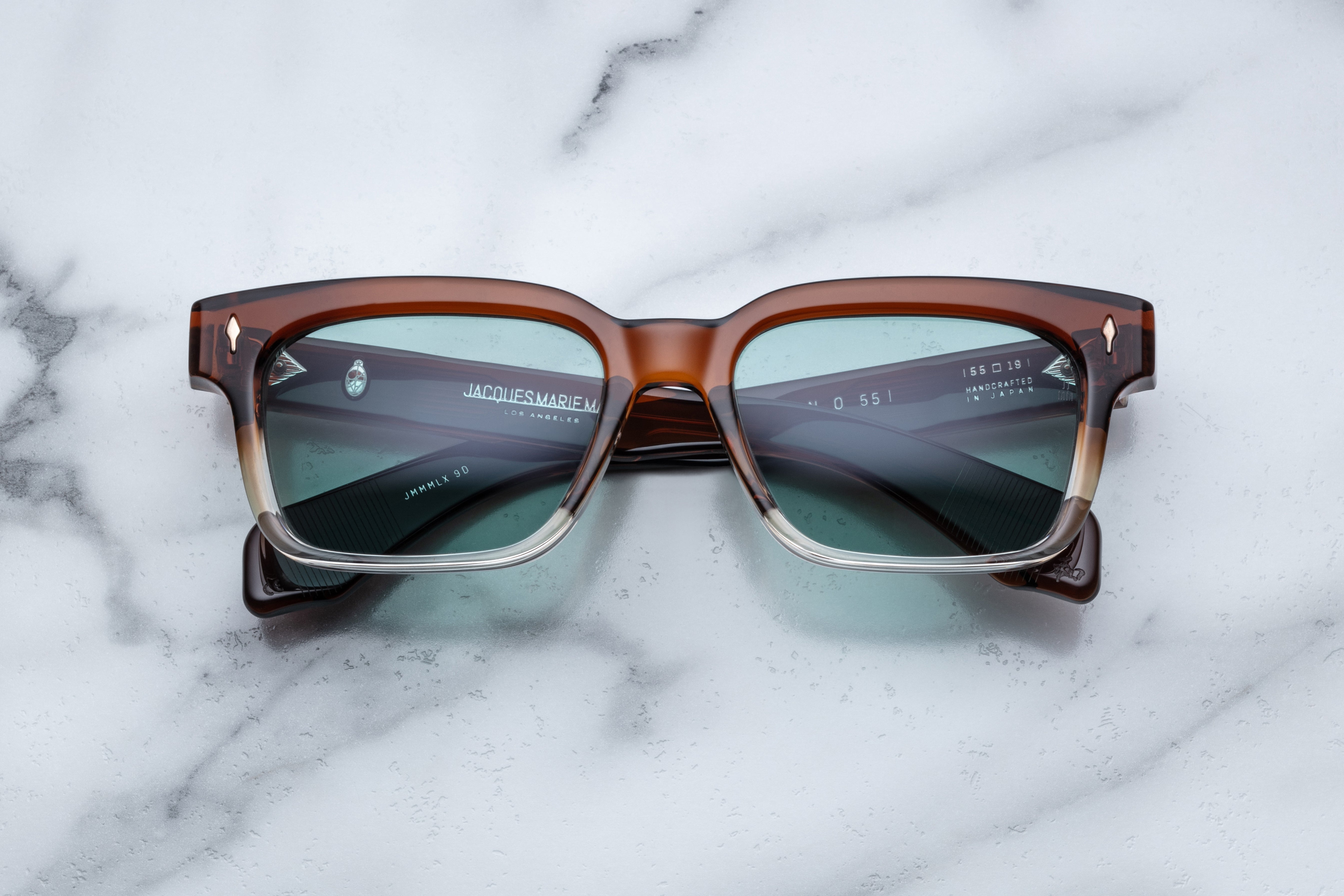 Jacques Marie Mage Molino 55 sunglasses with hickory fade frames and clear lenses, front view showing stylish design.