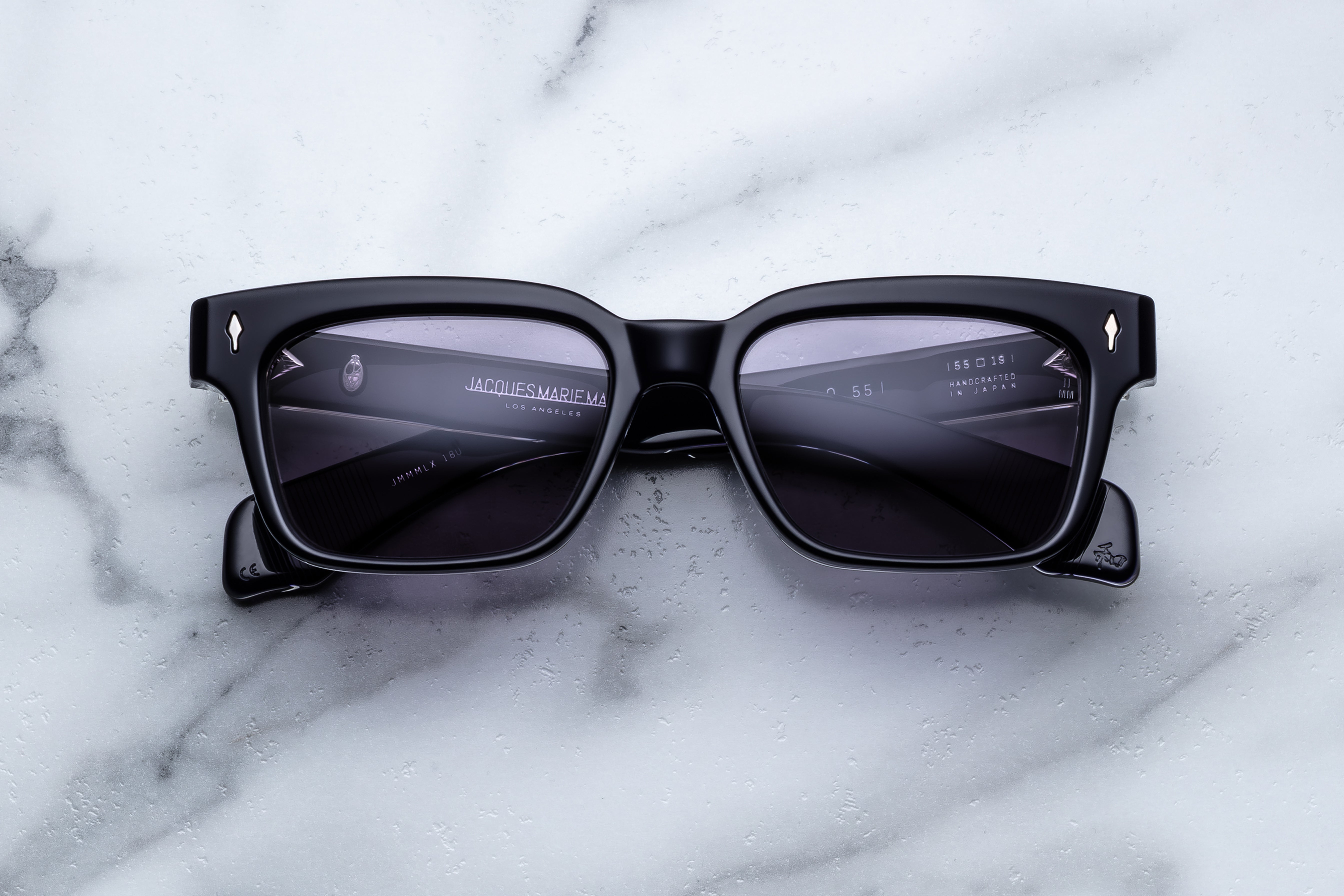 Jacques Marie Mage Molino 55 sunglasses with round frames and tinted lenses, front view showing stylish design.