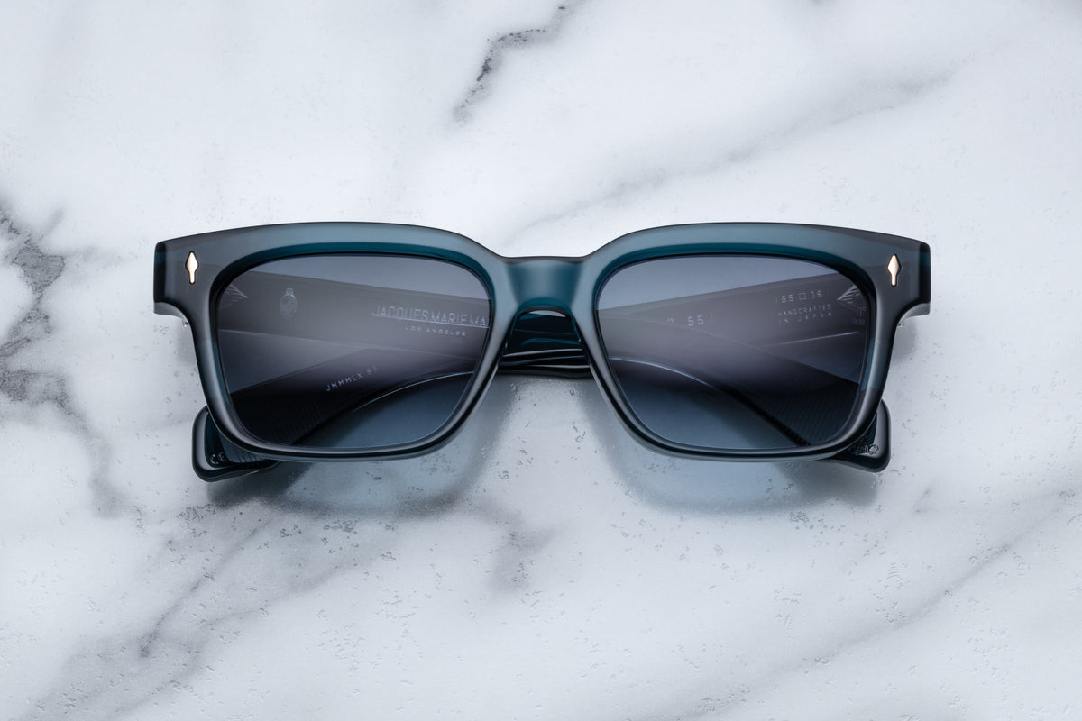 Jacques Marie Mage Molino 55 sunglasses in indigo with a front view, showcasing sleek stylish design and tinted lenses.