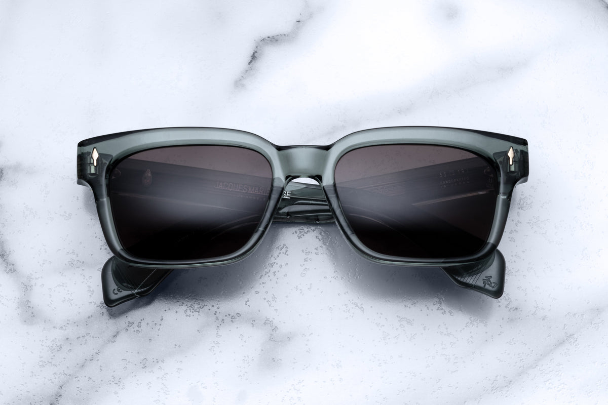 Jacques Marie Mage Molino 55 sunglasses with Juniper-colored frames and clear lenses, front view.