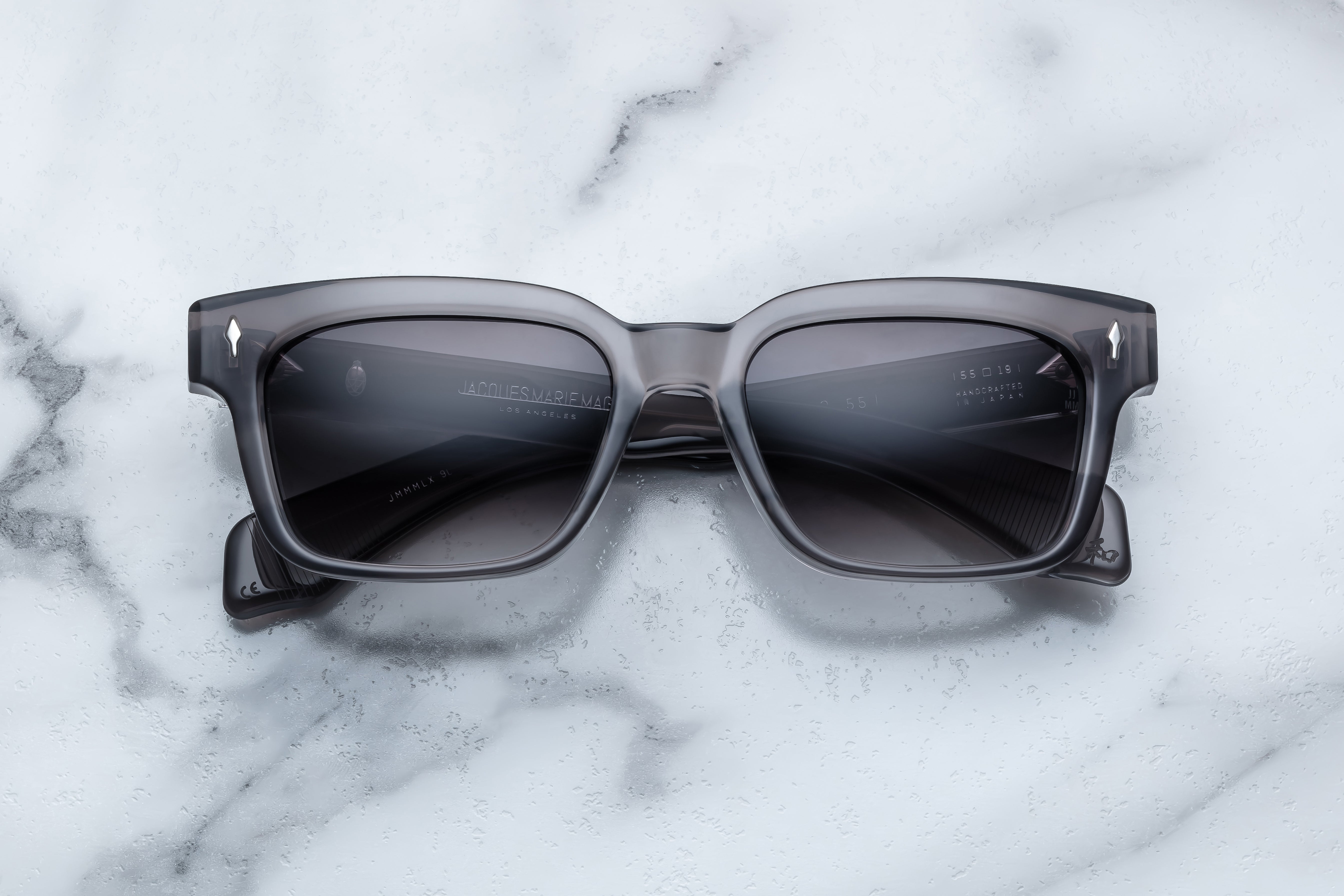 Jacques Marie Mage Molino 55 sunglasses with sleek frame and tinted lenses, front view showing stylish design.