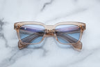 Jacques Marie Mage Molino 55 sunglasses with sand-colored frames and clear lenses, front view showcasing stylish design.