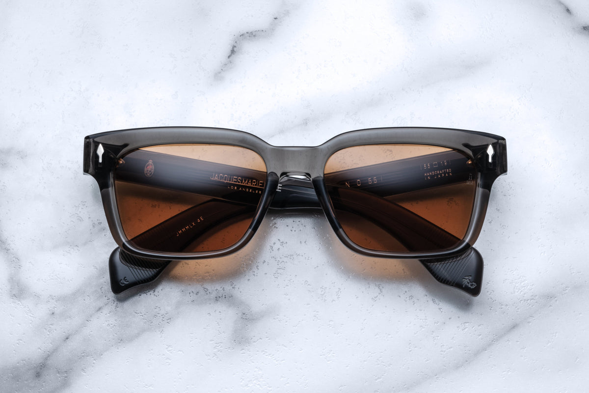 Jacques Marie Mage Molino 55 sunglasses with tortoise frames and amber lenses, front view showing stylish eyewear.