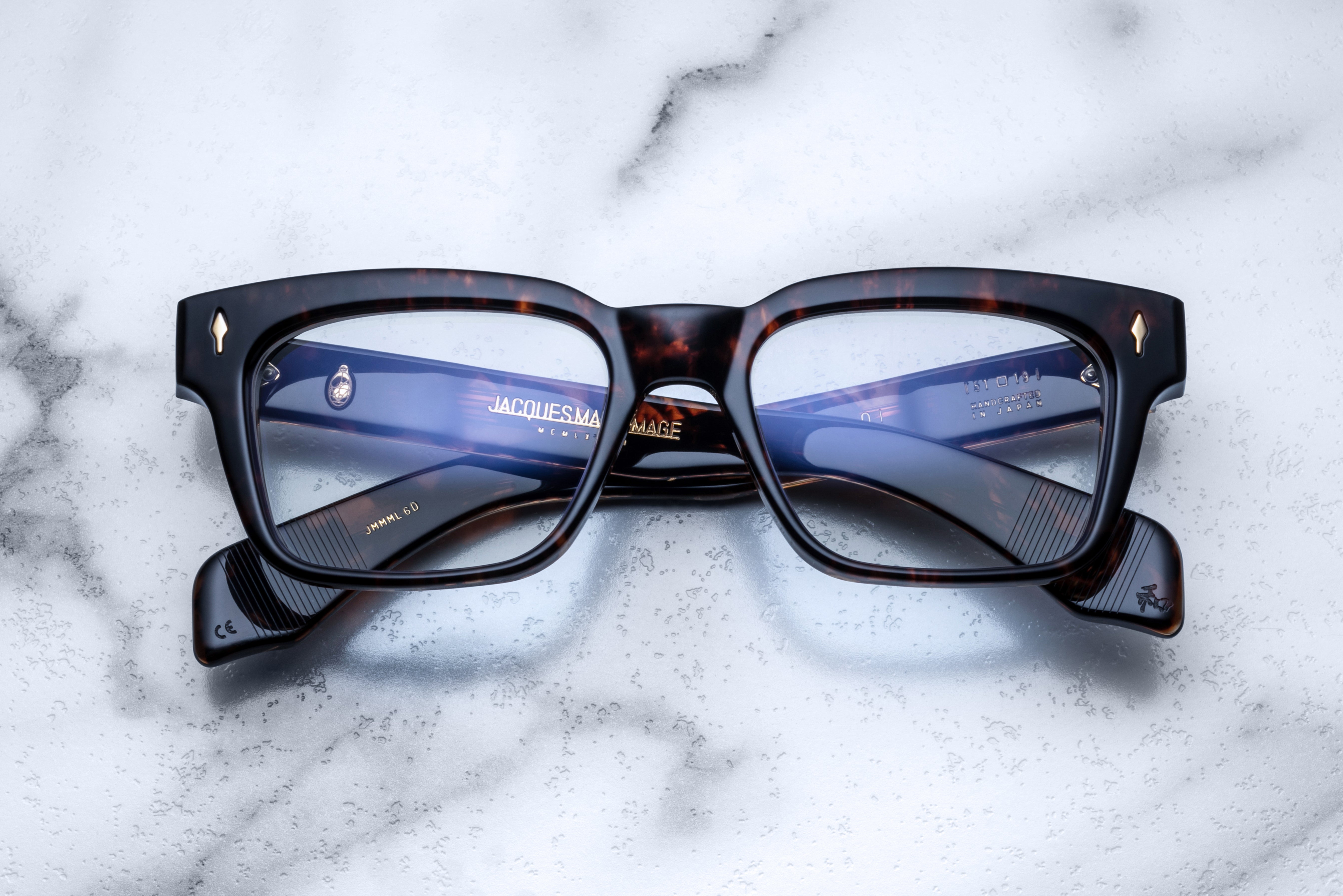 Optical MOLINO sunglasses by Jacques Marie Mage with clear front view showcasing stylish frame design.