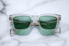 Jacques Marie Mage Molino beige sunglasses with rounded frames and clear lenses, front view.