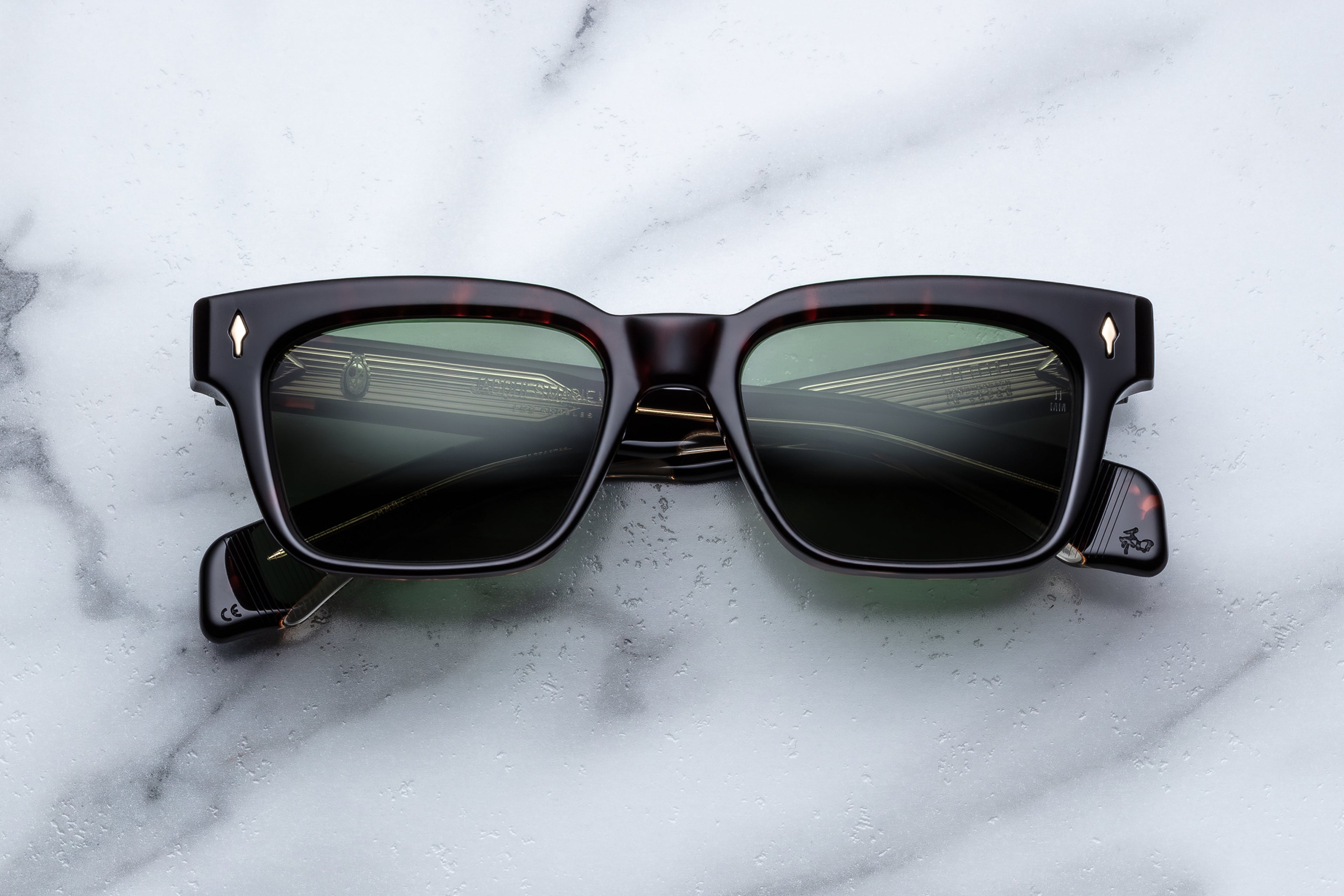 Jacques Marie Mage Molino sunglasses with sleek front view, showcasing modern design and stylish black frames.