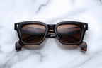 Jacques Marie Mage Molino Havana sunglasses with rounded frames and dark tinted lenses, front view showing stylish design.