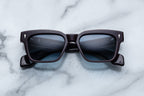 Jacques Marie Mage Molino wine-colored sunglasses with a sleek front view and stylish frame detail.
