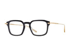 Black and gold Nolan sunglasses by Barton Perreira with sleek side accents and stylish frame details.