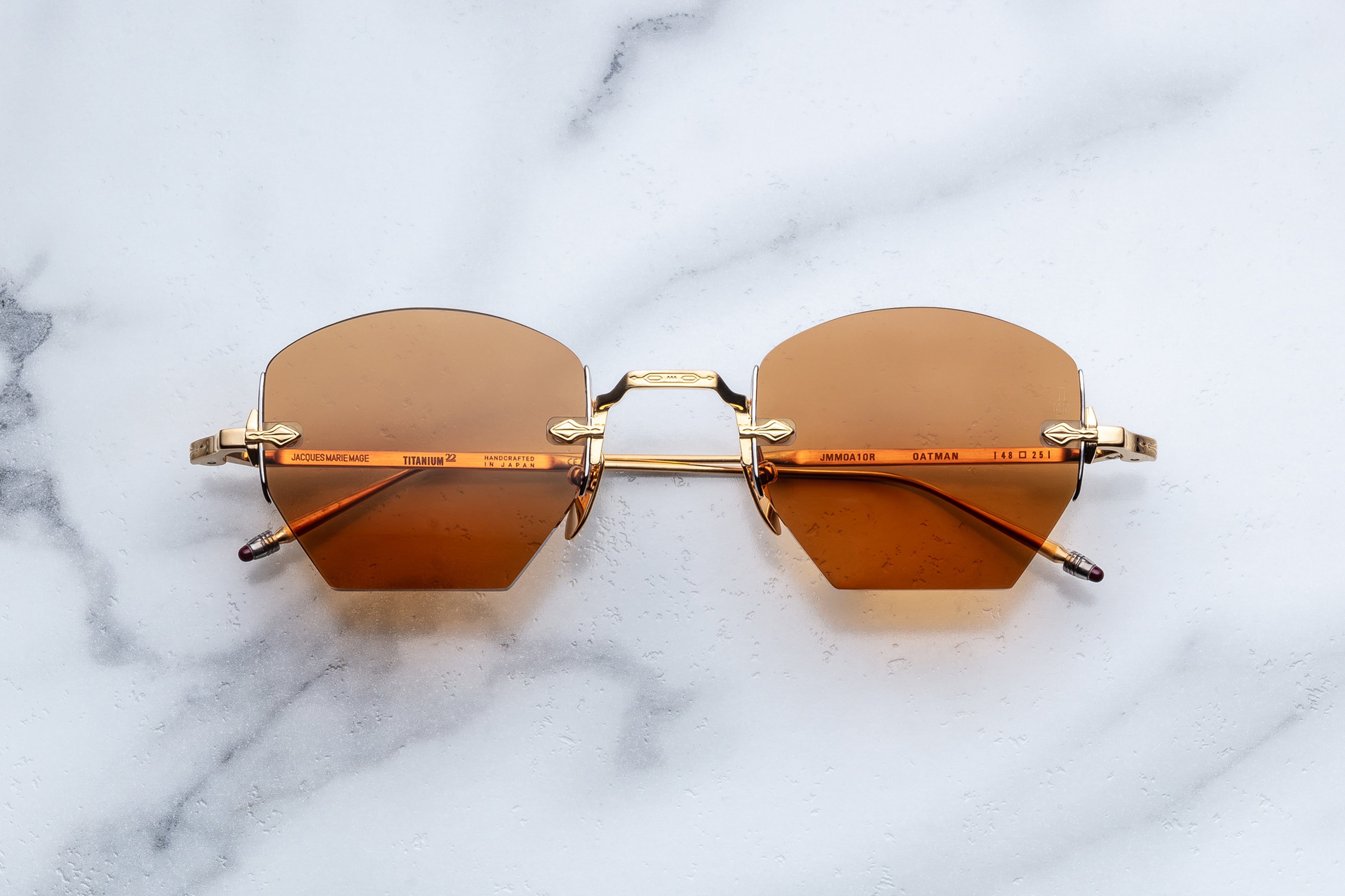 Jacques Marie Mage OATMAN sunglasses with tan frames and dark lenses, front view showcasing stylish eyewear design
