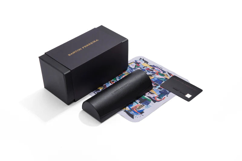 Anamcara Barton Perreira eyewear case in sleek black with logo detail, designed to protect and store high-end glasses.