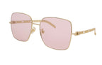 Gucci 724 sunglasses with black frames and dark lenses, stylish eyewear displayed on a website screenshot.