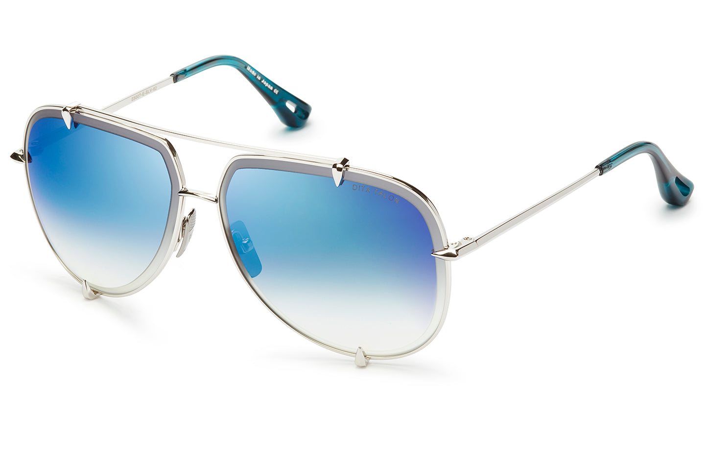 Dita TALON sunglasses with silver metal frame and angled design, showcasing the stylish eyewear from a side view.