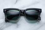 Jacques Marie Mage Torino black fade sunglasses with round frames and tinted lenses, front view showing stylish design.