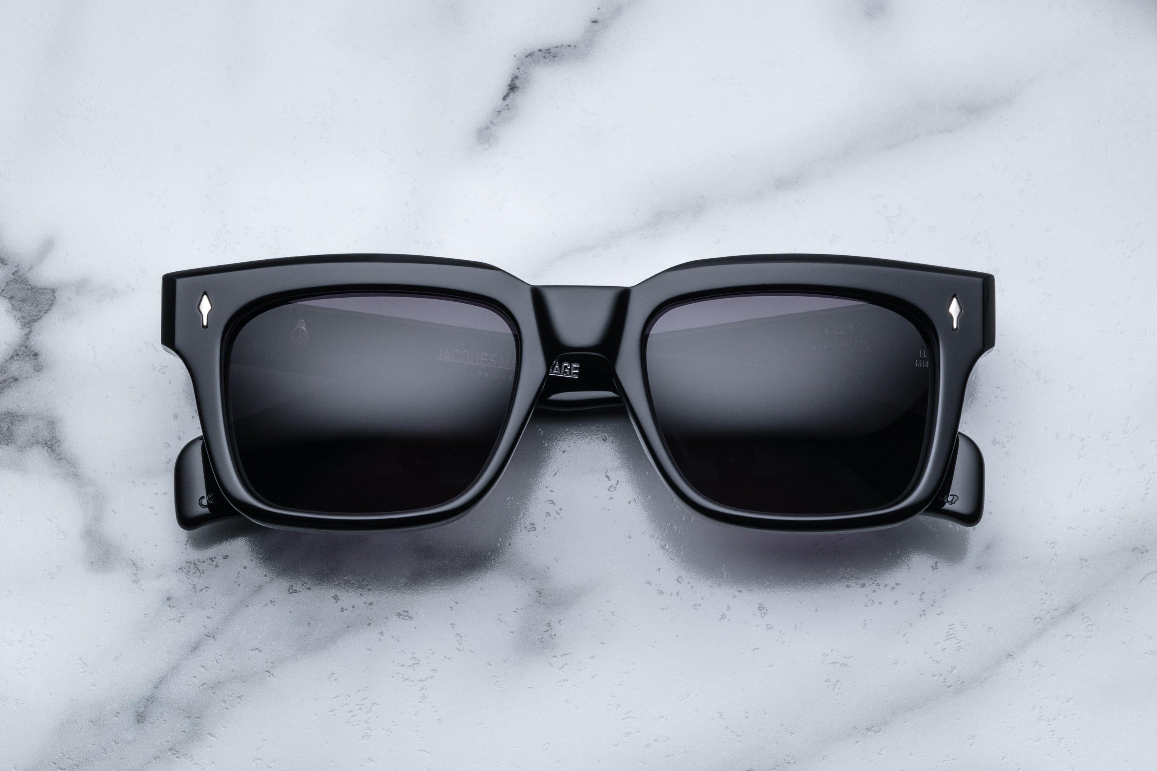 Jacques Marie Mage Torino black sunglasses with a sleek front view and modern design.