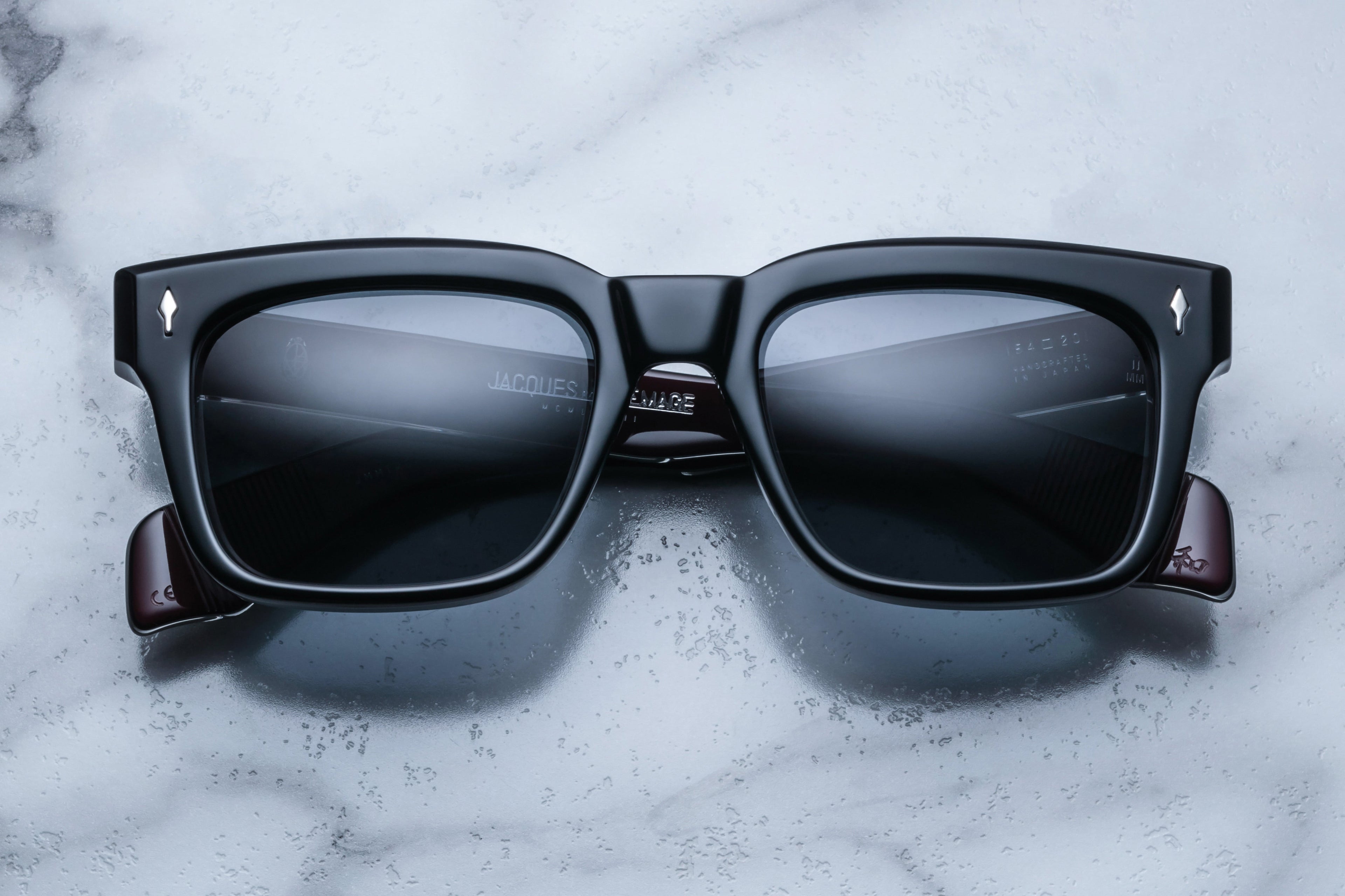 Jacques Marie Mage Torino Bloodstone sunglasses with bold frames and tinted lenses, stylish and modern eyewear design.
