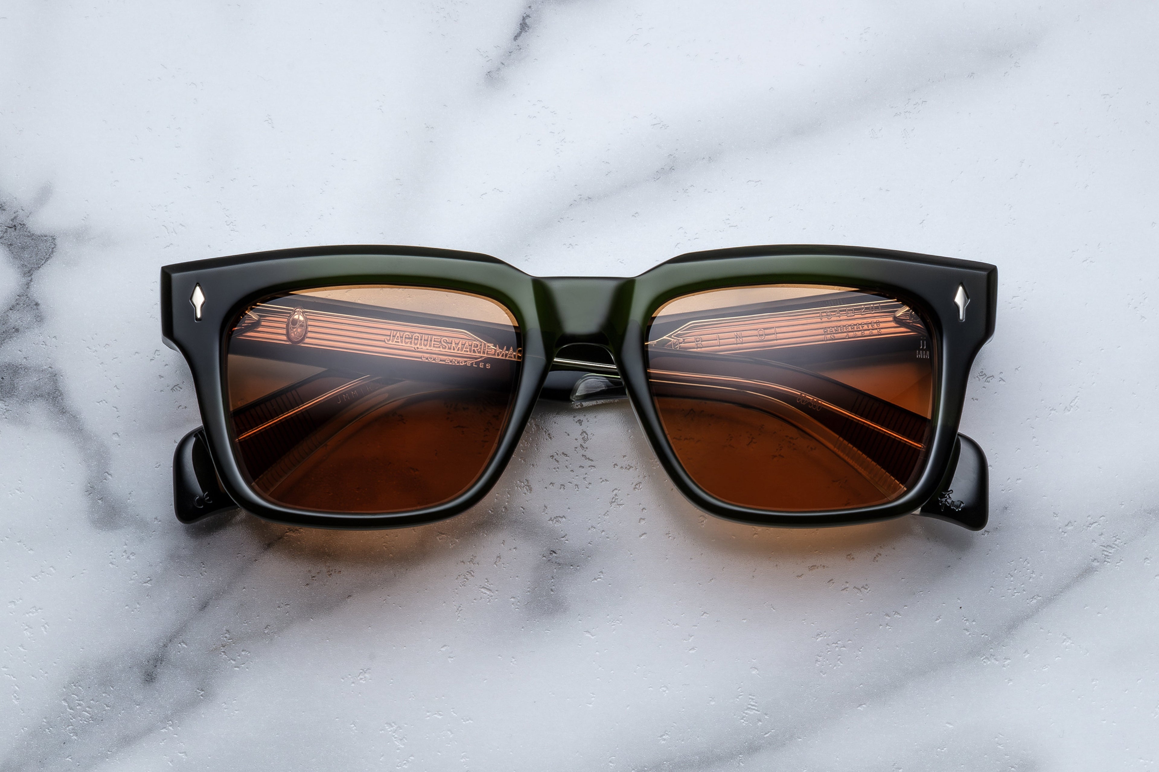 Jacques Marie Mage Torino Borneo sunglasses with rounded frames and tinted lenses, front view showing stylish design.