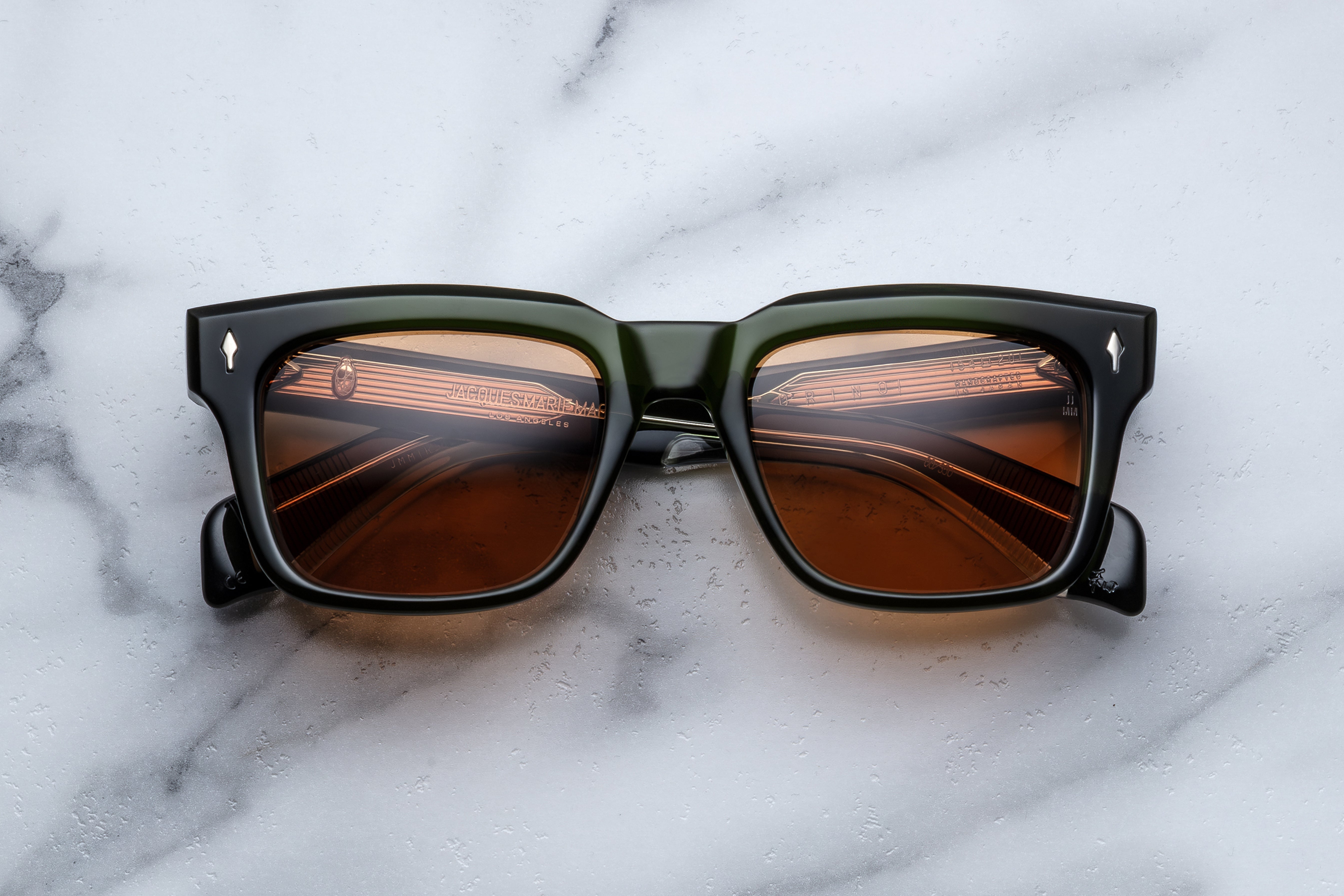 Jacques Marie Mage Torino Borneo sunglasses with rounded frames and tinted lenses, front view showing stylish design.