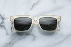 Jacques Marie Mage Torino sunglasses with bold black frames and tinted lenses, front view showing stylish design.