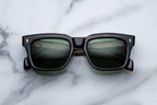 Jacques Marie Mage Torino sunglasses with round frames and clear lenses, front view showing sleek, stylish design.