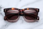 Jacques Marie Mage Torino Havana sunglasses with round frames and tinted lenses, showcasing stylish and sophisticated eyewear.