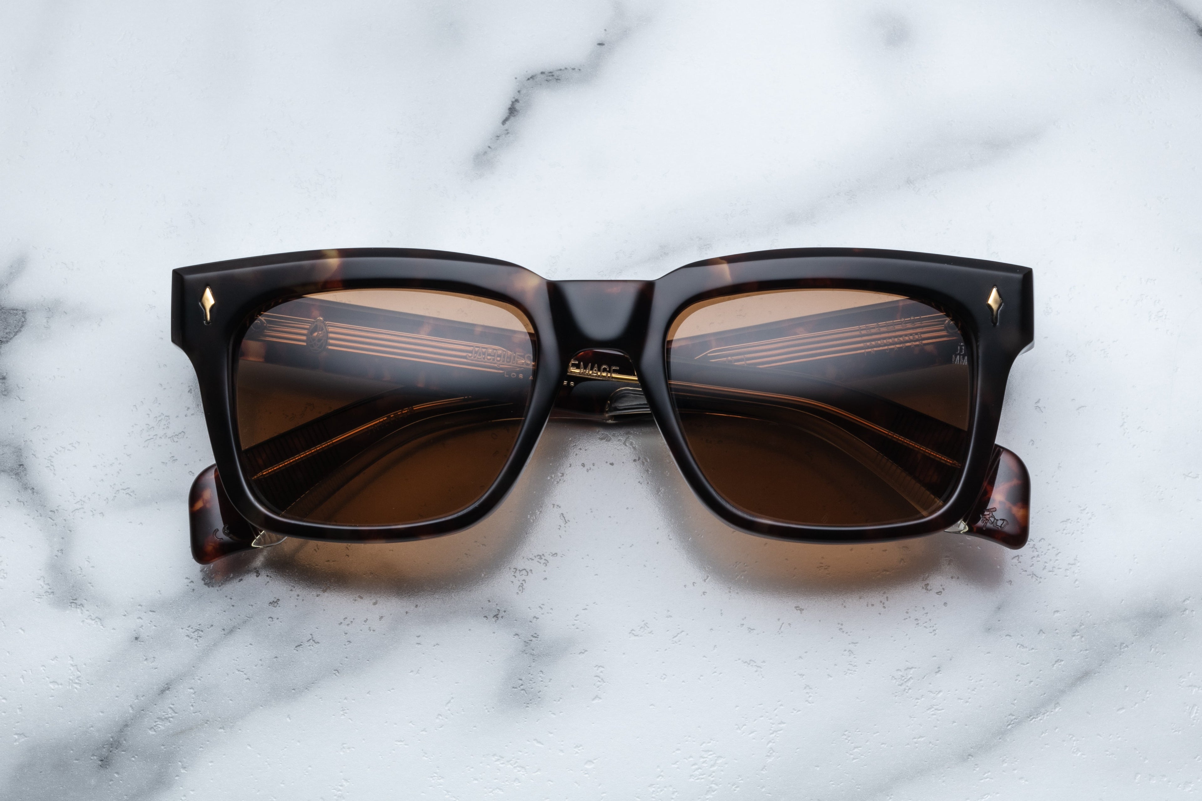 Jacques Marie Mage Torino Havana sunglasses with rounded frames and tortoiseshell finish, front view.
