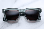 Jacques Marie Mage Torino Juniper sunglasses with round frames and tinted lenses, front view showing stylish design.