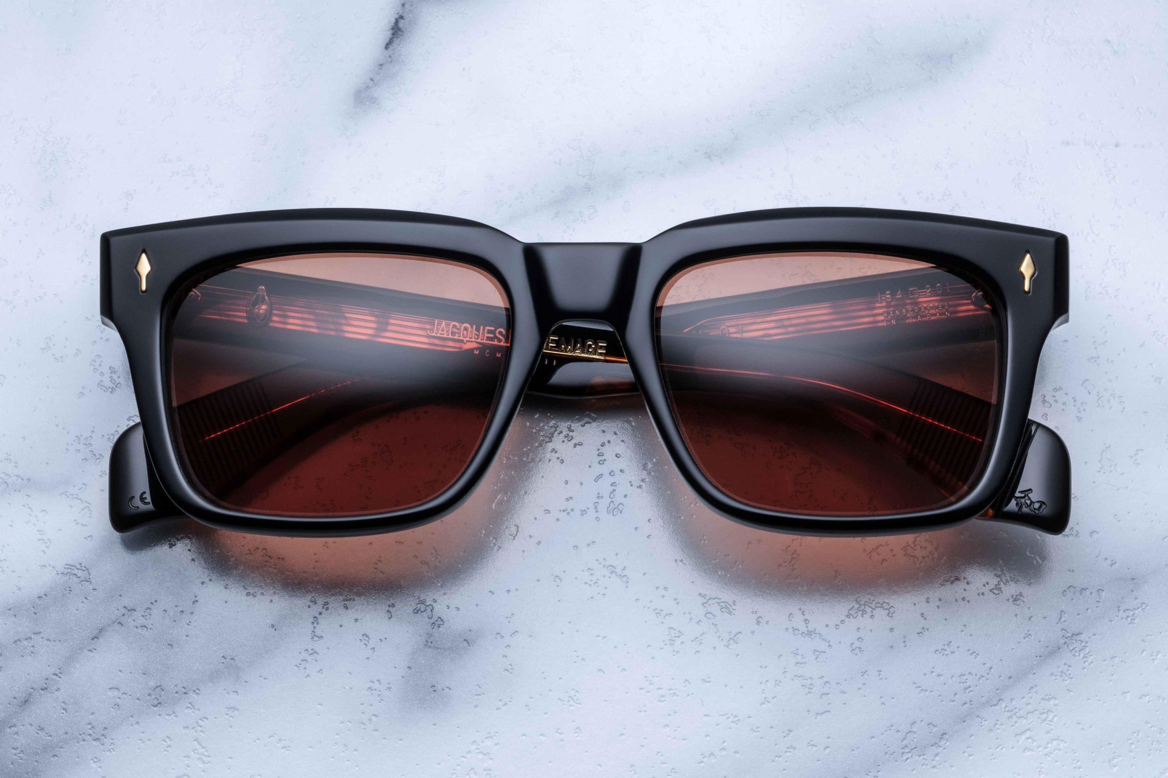 Jacques Marie Mage Torino Noir sunglasses with dark tinted lenses and sleek black frame shown from front view.