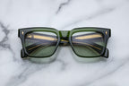 Jacques Marie Mage Torino sunglasses with rounded frames and dark lenses, shown from the front.
