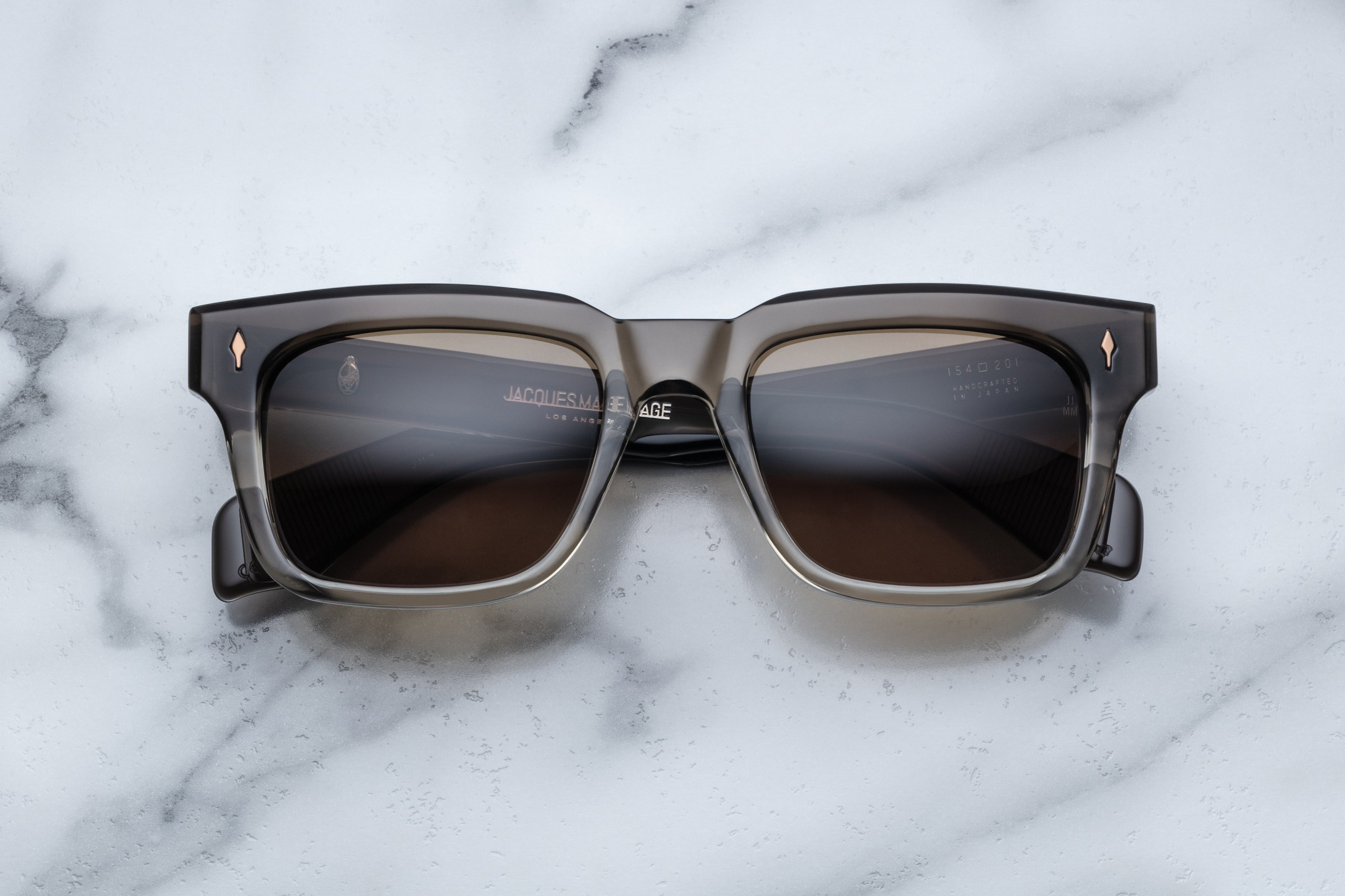Jacques Marie Mage Torino sunglasses with smoky fade lenses and bold frame, front view showing sleek design and stylish details.