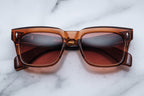 Jacques Marie Mage Torino Terra sunglasses with rounded frames and tinted lenses, front view showing stylish design.