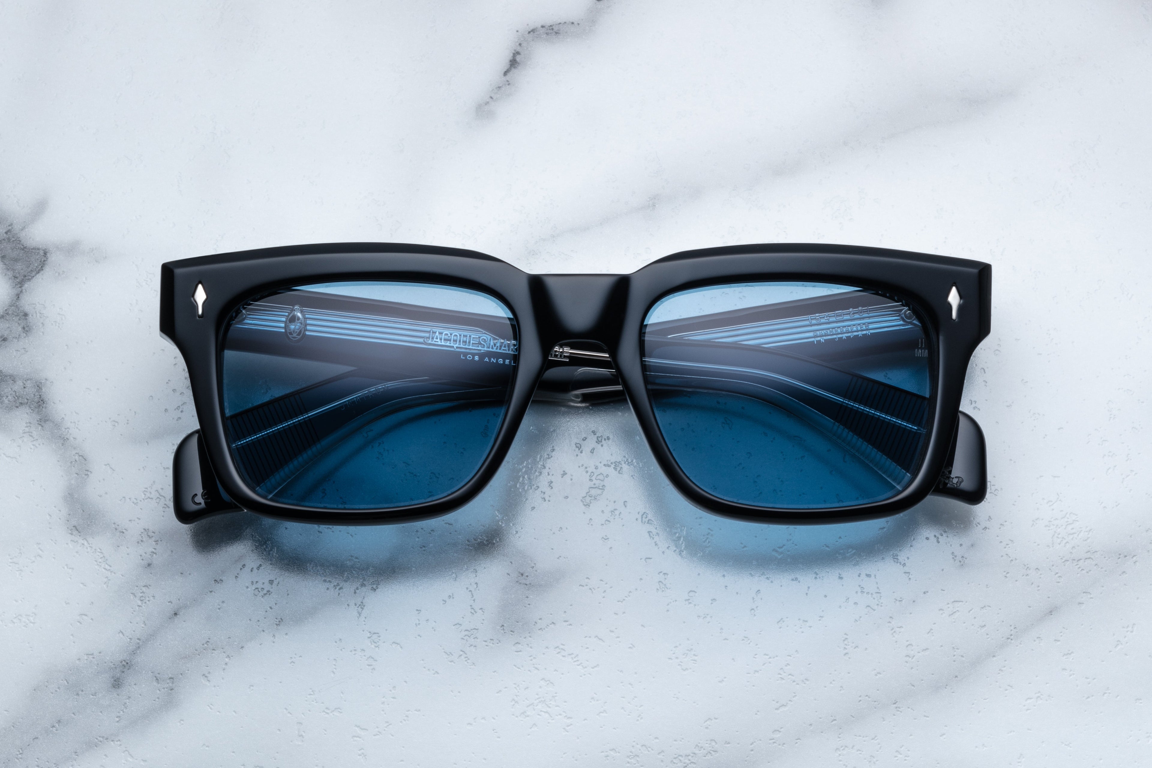 Jacques Marie Mage Torino sunglasses with titanium frames, front view showcasing sleek, modern design and tinted lenses.
