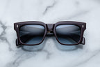 Jacques Marie Mage Torino sunglasses with wine-colored frames, front view showing sleek design and tinted lenses