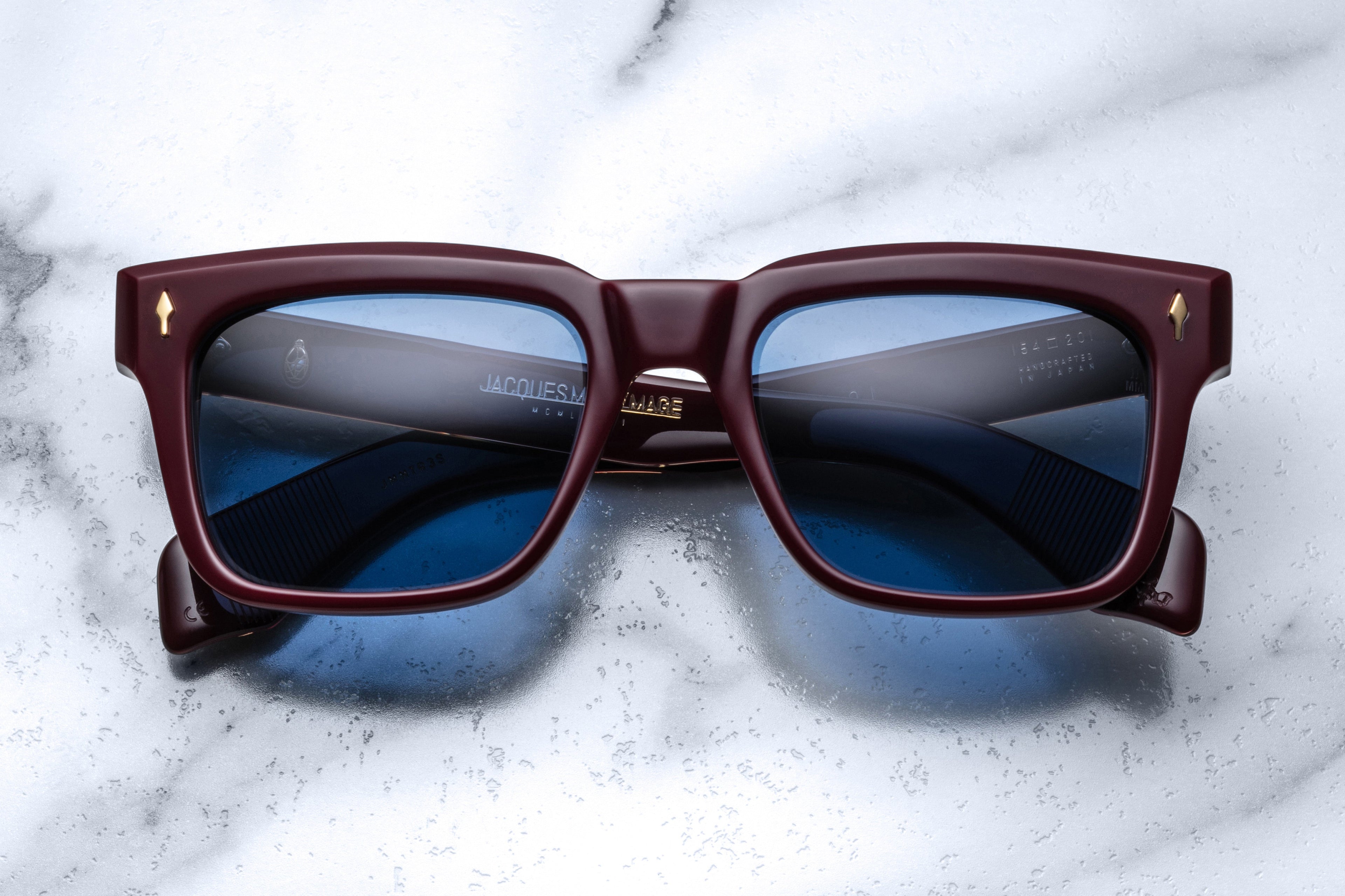 Jacques Marie Mage Torino sunglasses with rectangular frames and dark tinted lenses, front view showcasing stylish eyewear.
