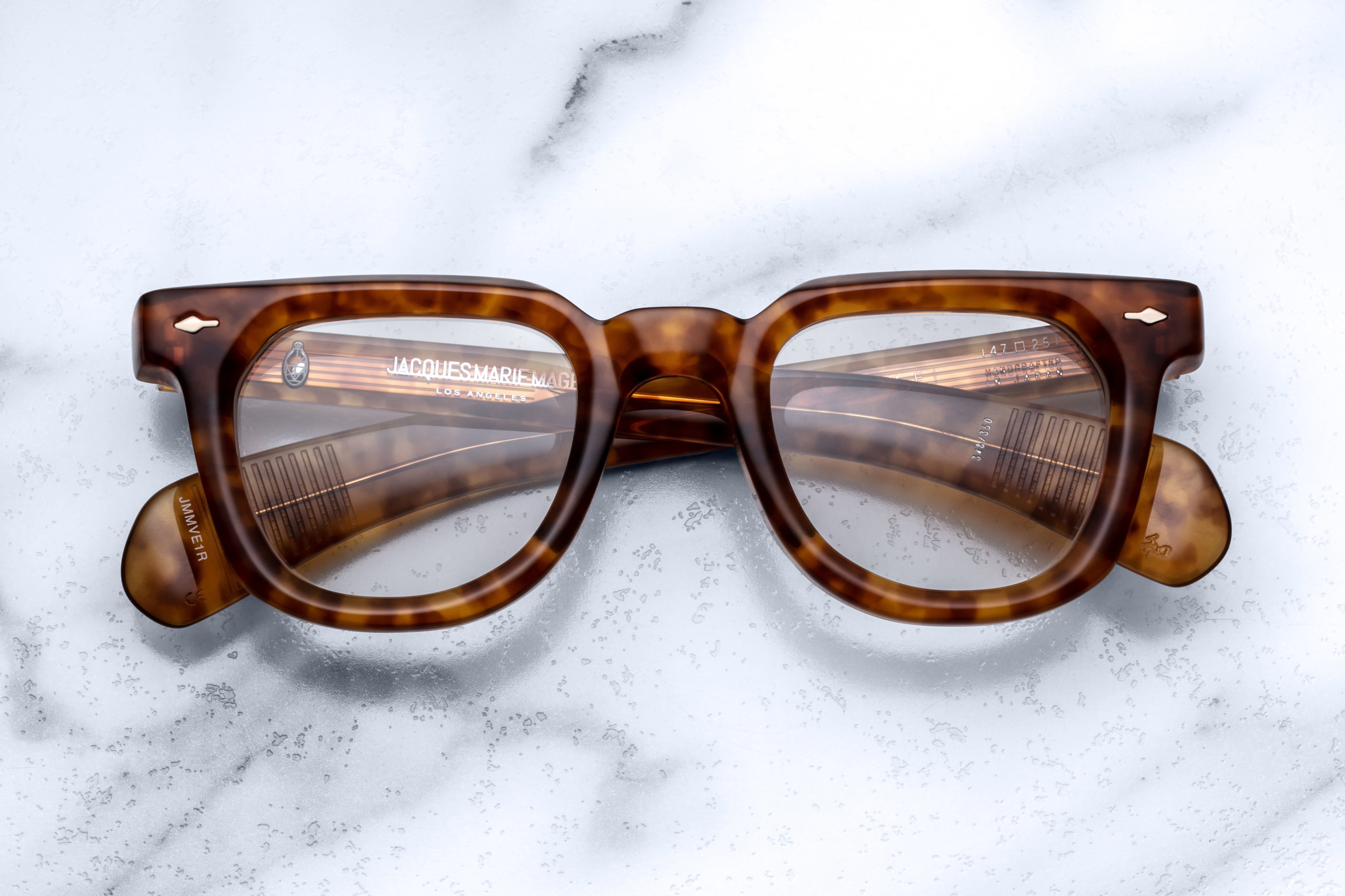 Optical VENDOME eyewear by Jacques Marie Mage with camel-colored frames and clear lenses, front view showing stylish design.